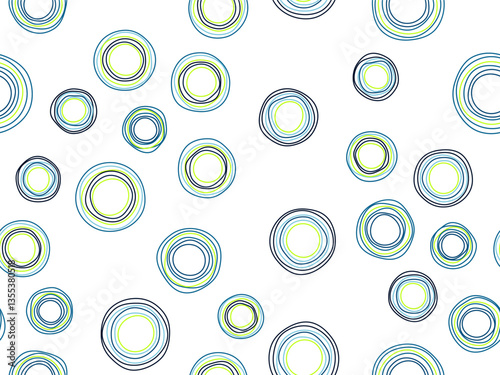 A lively and colorful design showcasing hand-drawn circular patterns in blue and green tones.