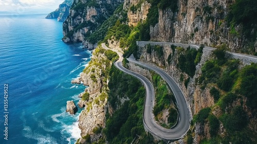 Dramatic Amalfi Coast road with winding turns clinging to the cliffs edge