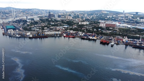 Photography Aerial view of oil spill polluting the sea by cargo ships and containers in vlad