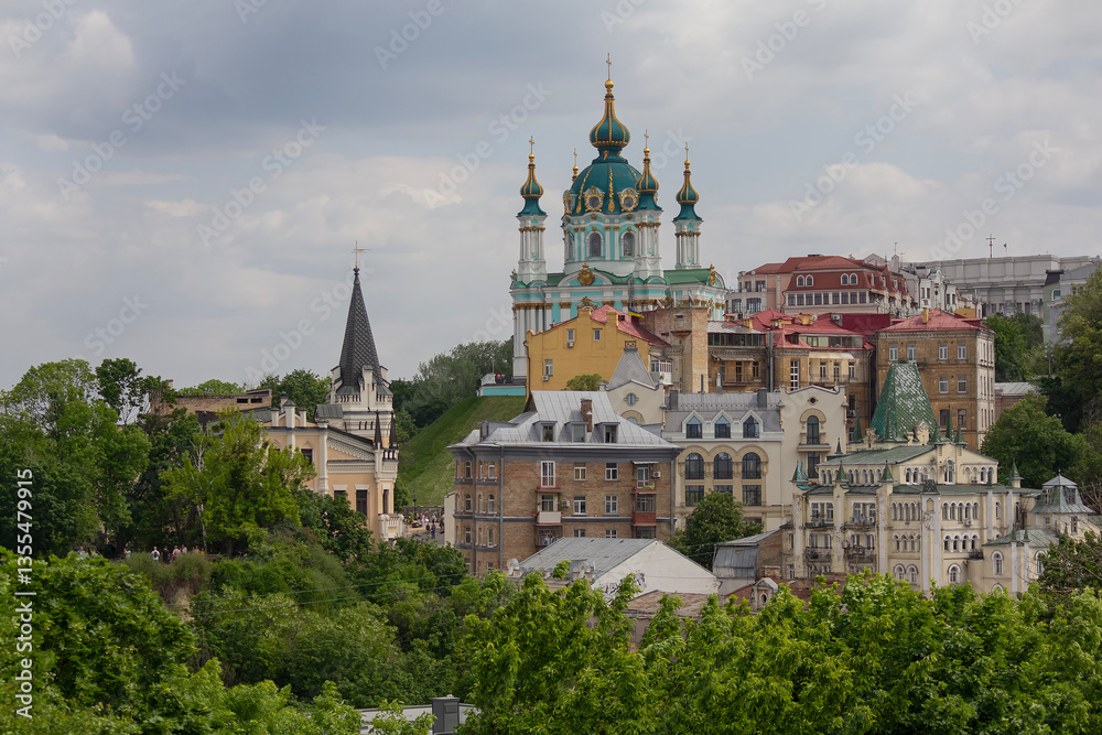 Beautiful view of the ancient street Andrew's Descent and the St. Andrew's Church. Kyiv, Ukraine Beautiful view of the ancient street Andrew's Descent and the St. Andrew's Church. Kyiv, Ukraine