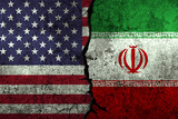 USA vs Iran political clashes and conflict representation with flags painted on grunge textured wall backdrop