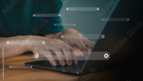 Focusing on a search bar with a magnifying glass icon. Concept of represents online searching, research, and digital information gathering. Male hand types on a laptop keyboard.