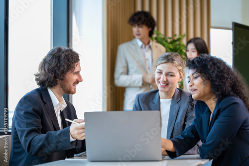 Team of diversity business people are discussing over the new strategic strategy project on investment real estate while working in modern office building for new project and planning usage