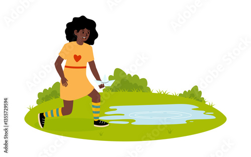 Girl exploring nature while walking near a small pond on a sunny day in a park
