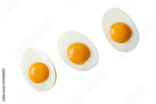 three soft boiled eggs, yolk visible, white background, isolated, no background