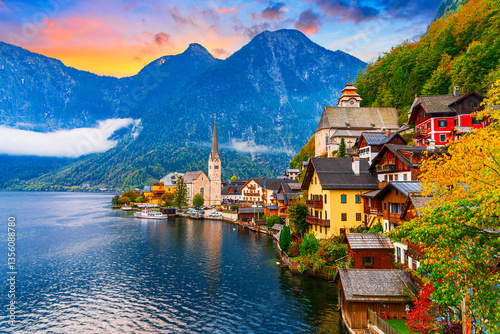 Hallstatt, Austria, Salzkammergut region: Misty autumn scenic morning view of Hallstatter See or Lake Hallstatt and the old town church in world famous alpine village in Upper Austria, Europe