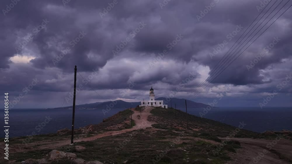 A timelapse of Armenistis Lighthouse in Mykonos during sunrise as night gives way to day A timelapse of Armenistis Lighthouse in Mykonos during sunrise as night gives way to day