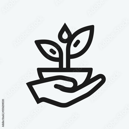 Hand holding growing plant in a pot, symbolizing nurturing nature