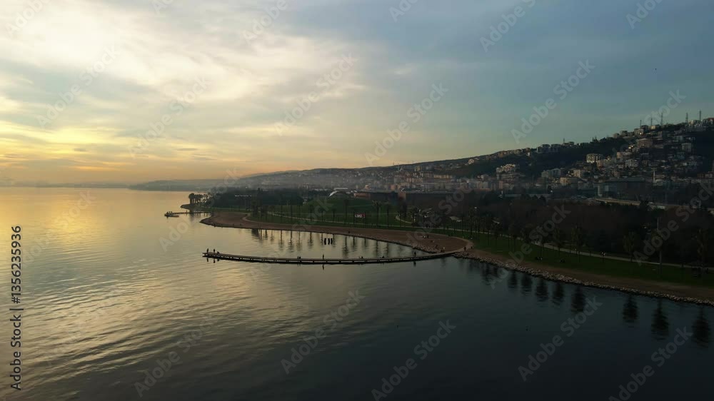 Aerial view of the sea at sunset time in the city