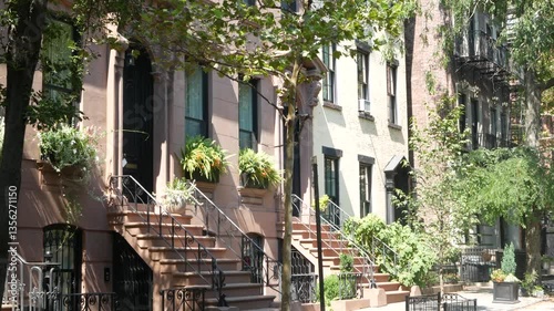 New York City townhouse building, Brooklyn Heights residential district, USA. Brownstone urban architecture, attached house. United States real estate, american property, apartments and homes in NYC.