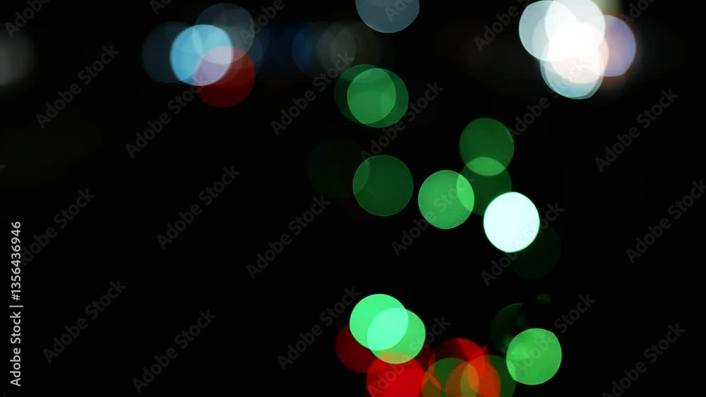 Colorful Bokeh Lights on Dark Background, Abstract image of colorful bokeh lights against a dark background, featuring red and green circles Colorful Bokeh Lights on Dark Background, Abstract image of colorful bokeh lights against a dark background, featuring red and green circles