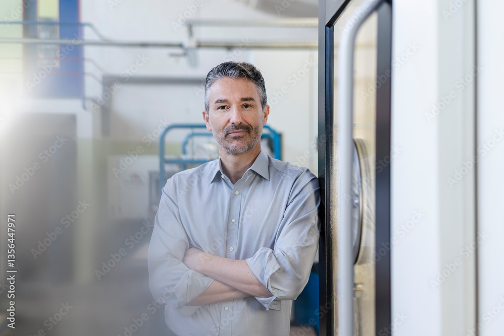 Competent businessman working in his company, portrait Competent businessman working in his company, portrait