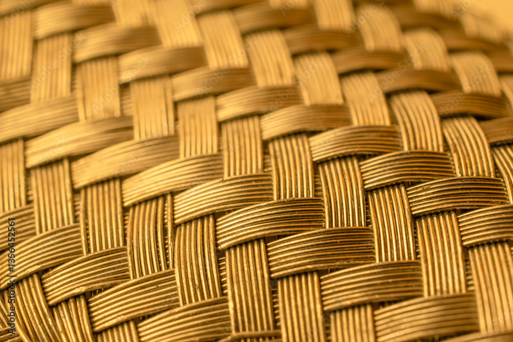 Obraz premium wire mesh woven gold background or texture