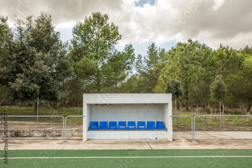 Empty reserve bench at soccer field