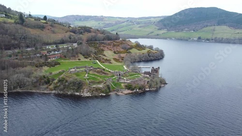 aerial footage of scenic Urquhart castle in loch ness