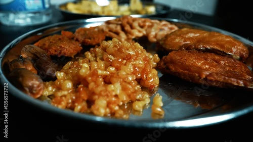 Indian Thali with Traditional Sweets and Snacks, A close-up of an Indian thali with traditional sweets and snacks, including jalebi, pakoras