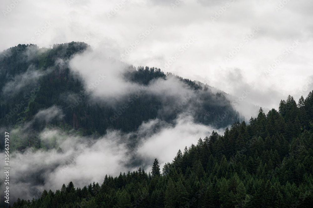 Fototapeta premium cloudy mountain landscape inside Val di Fassa, Dolomites, Italy