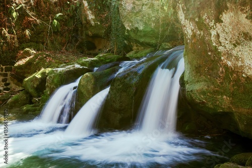 Obraz na płótnie
the natural waterfall of the Enz in the Southern Eifel nature reserve w salonie