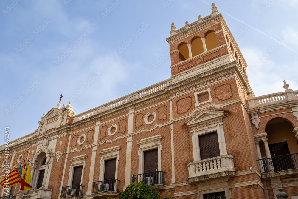 Naklejka premium The Archdiocese of Valencia, an architectural gem, stands as a symbol of faith and history. Located in the heart of the city, it showcases Valencia's rich cultural heritage.