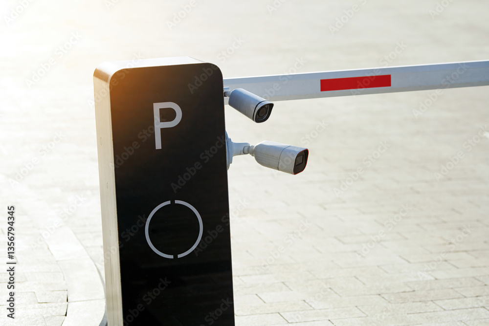 Security surveillance cameras mounted on parking entrance barrier, automated access control, real-time monitoring for vehicle entry and safety enforcement. Parking security system with CCTV cameras