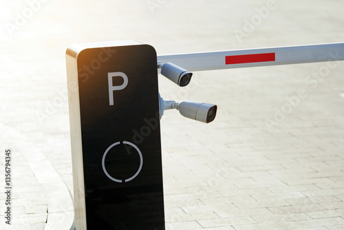Obraz na płótnie Security surveillance cameras mounted on parking entrance barrier, automated access control, real-time monitoring for vehicle entry and safety enforcement. Parking security system with CCTV cameras w salonie