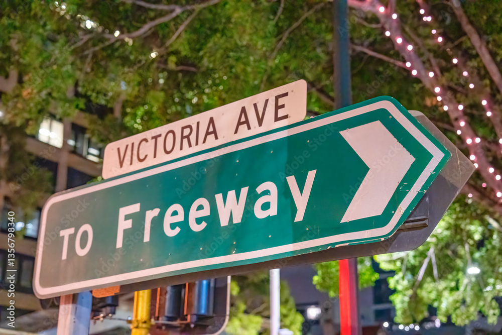 To Freeway street sign at night