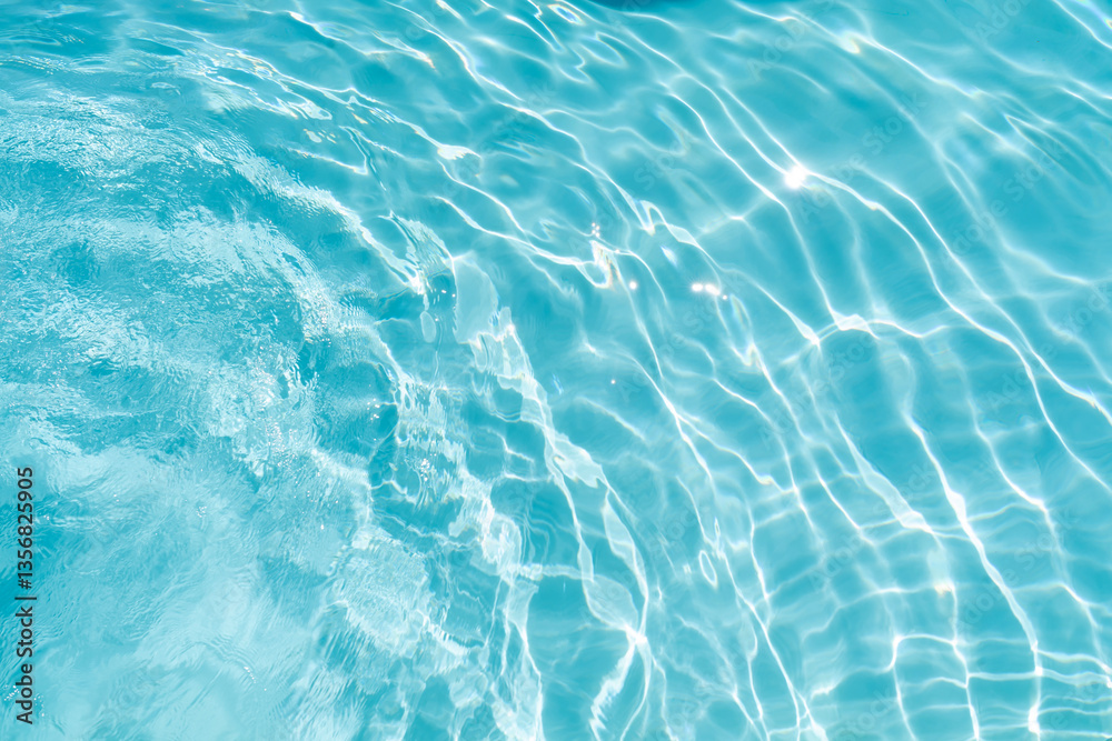 Obraz premium Water in swimming pool rippled water detail background.