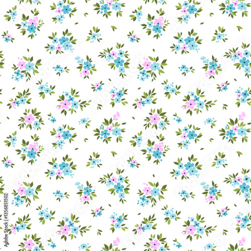 Easter spring floral pattern in small abstract flowers. Small light blue and pink flowers. White background. Ditsy print. Floral seamless background. Cute template for fashion prints.