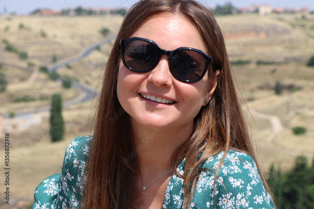 happy girl in sunglasses against the background of an ancient city happy girl in sunglasses against the background of an ancient city