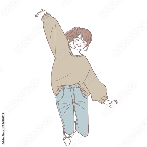 ジャンプしているニットを着た若い女性