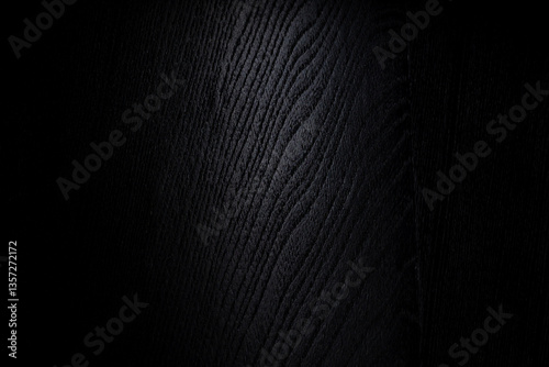 black wooden panel made of unknown wood with texture