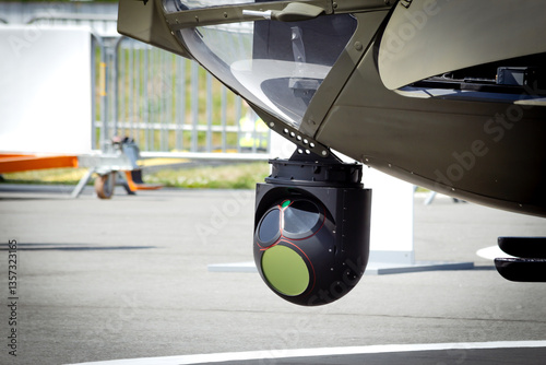Camera sensor pods under an aerial surveillance helicopter