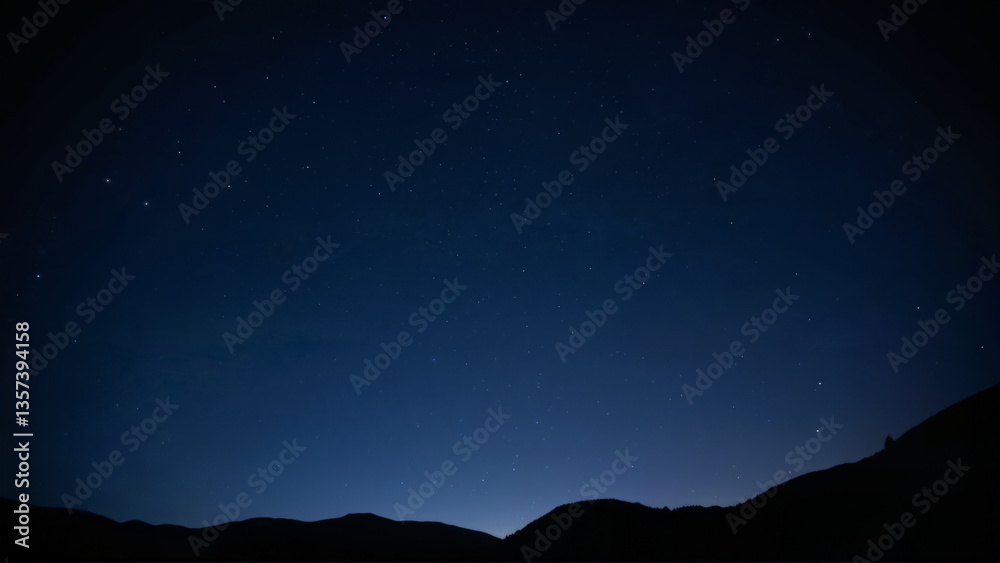Starlit Sky Over Mountain Silhouettes at Dusk Starlit Sky Over Mountain Silhouettes at Dusk