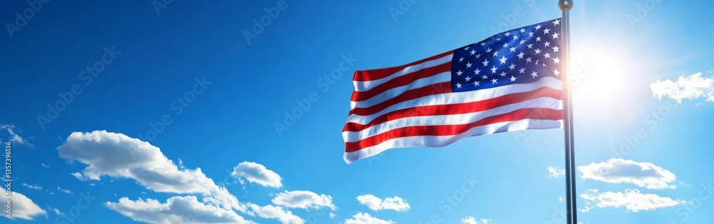 Fototapeta premium American Flag Waving in the Breeze Against a Beautiful Cloudy Sky in Full Detail