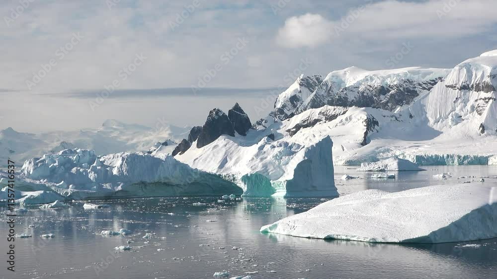 Exploring breathtaking icy landscapes filled with massive glaciers and serene waters in Antarctica during the summer months Exploring breathtaking icy landscapes filled with massive glaciers and serene waters in Antarctica during the summer months