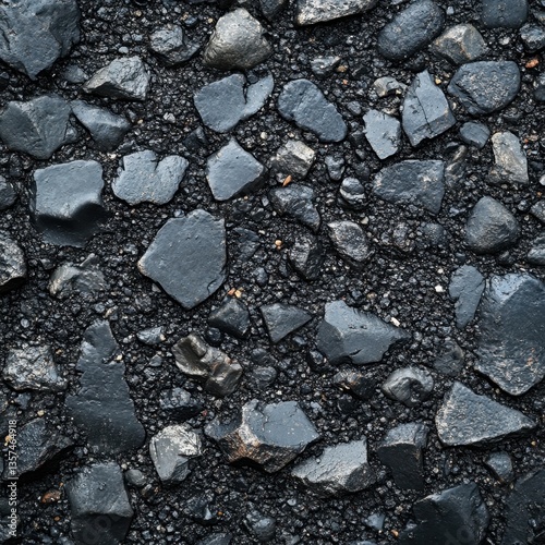 Wallpaper Mural Asphalt Pavement Texture with Embedded Stones Creating a Rugged and Dark Surface Overhead Shot Torontodigital.ca