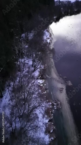 Drone flight along a Scottish loch in winter