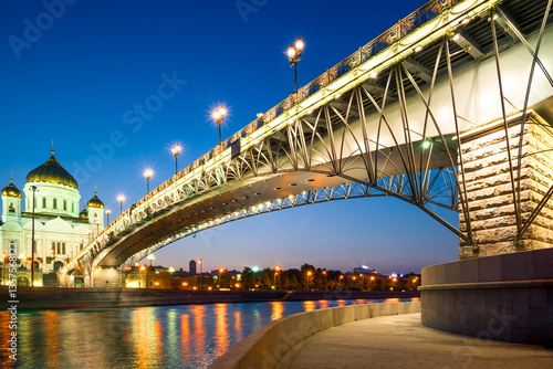 The Orthodox Cathedral of Christ the Savior and the Patriarchal bridge over the night Moskva River. Moscow
