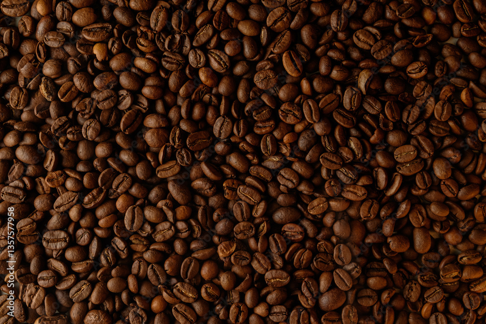 Fototapeta premium Richly roasted coffee beans create a tapestry of deep, aromatic colors