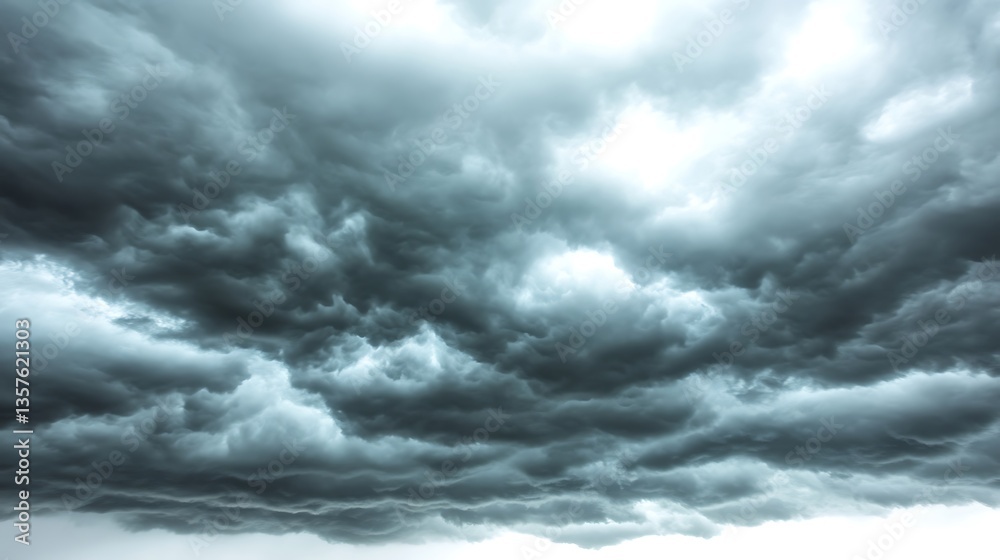 Dramatic dark storm clouds fill the sky. Dramatic dark storm clouds fill the sky.
