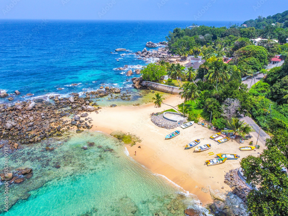 Aerial view of wooden boats in a tropical beach