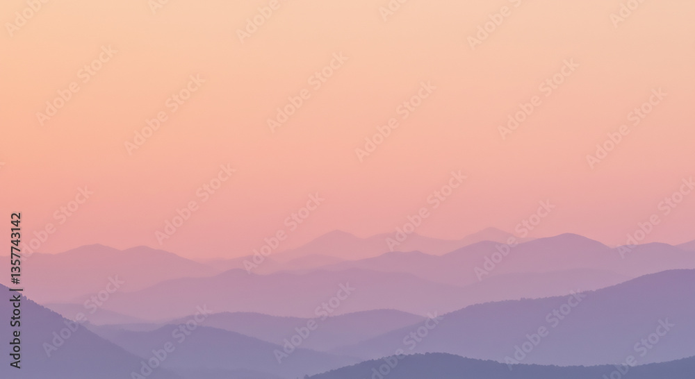 Serene Landscape of Distant Mountains in Soft Pastel Colors Fading into Gradient Sunset Sky with Shades of Lavender, Coral, and Pale Yellow Ideal for Landscape-Style Wallpaper Applications in Home Dec