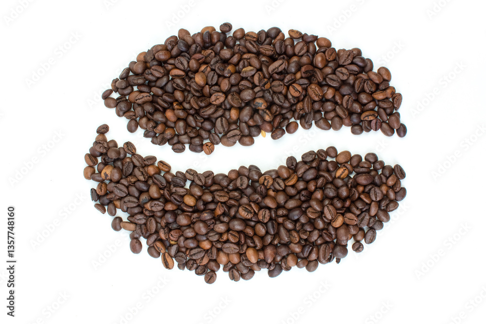 A pile of coffee beans on a white background in the shape of a cup and saucer. Top view. A pile of coffee beans on a white background in the shape of a cup and saucer. Top view.