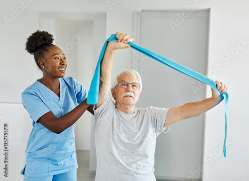 senior care exercise physical therapy exercising help assistence retirement home physiotherapy physiotherapist fitness gym strech clinic therapist elderly woman band stretching man dumbbell