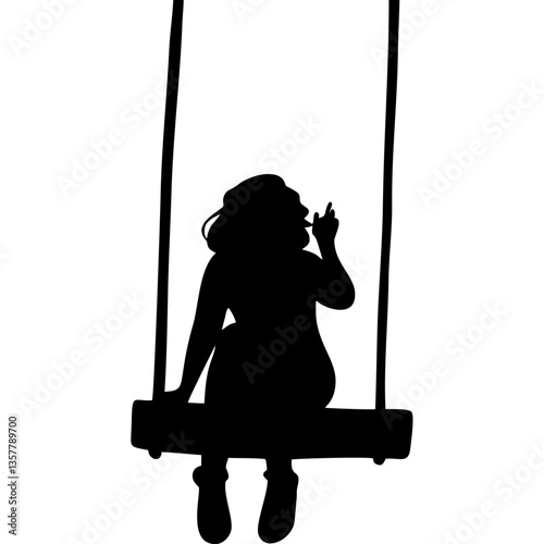 Silhouette of girl sitting on swing with hand raised
