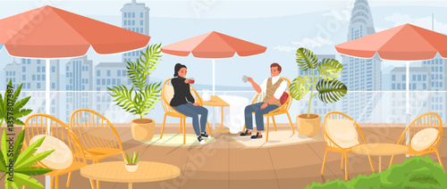 Two individuals sit comfortably at a rooftop cafe, sipping beverages and enjoying the skyline view, surrounded by plants and cozy seating, on a clear day.