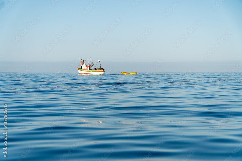 Fishing Boat on the Horizon of a Calm Day at Sea