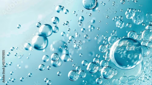 Wallpaper Mural Droplets of water form enchanting bubbles, glimmering under bright blue light, creating a tranquil and refreshing atmosphere. The visual captures the essence of fluid movement and light interplay Torontodigital.ca