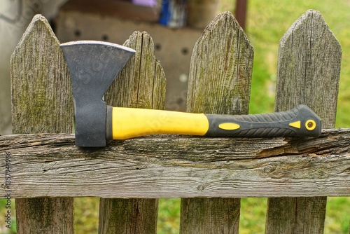Fotografie one small sharp new iron black dangerous modern with plastic yellow handle indus