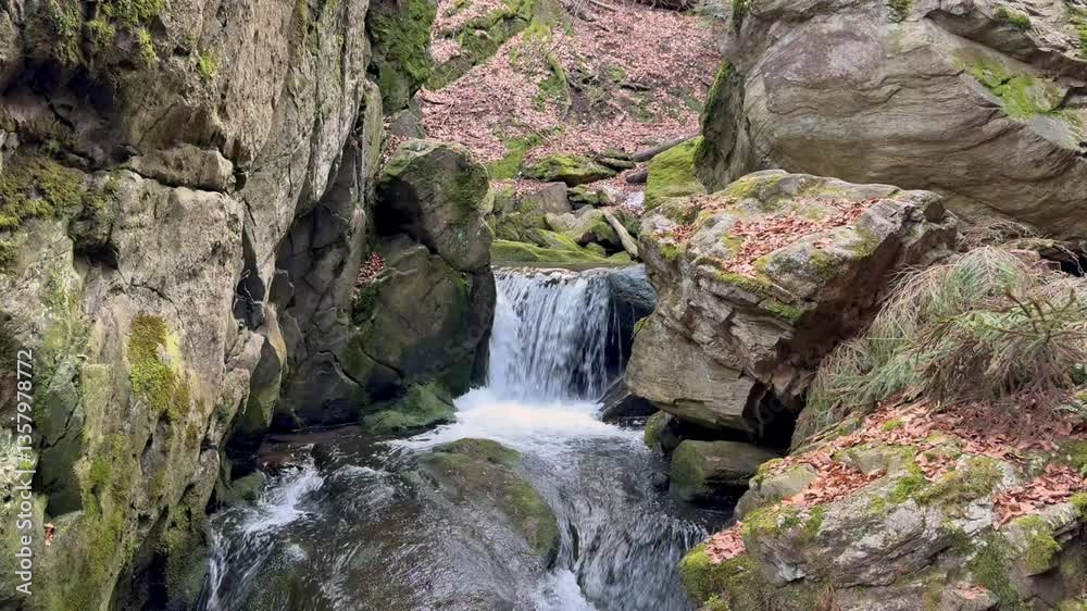 Mountain Waterfall Among Rocks and Forest Mountain Waterfall Among Rocks and Forest